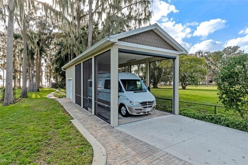 Covered and screened Class B RV garage