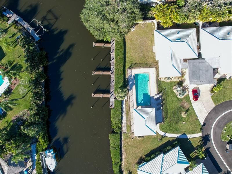 Community Pool, Boat dock and Canal tha leads to the Gulf located directly across the street ffrom the home.  Paradise awaits!!!