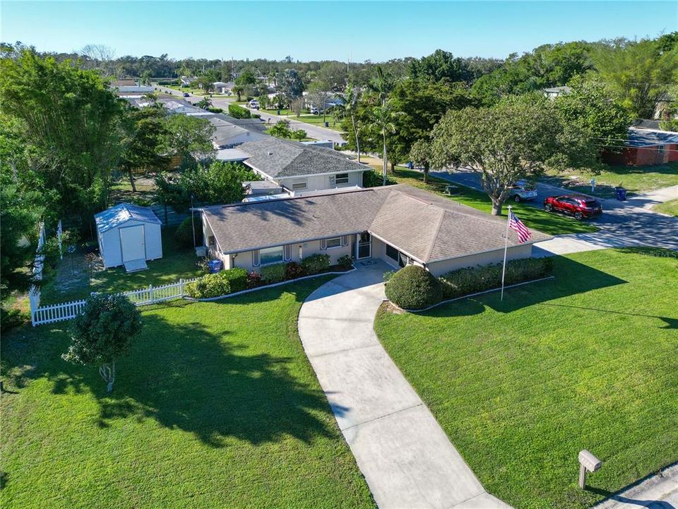Such a sweet lot. Manicured and well maintained with excellent curb appeal and affordable! White picket fence and a workshop in the shed. South Gate Ridge with lovely homes surrounding you!