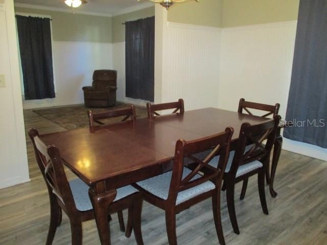 Range and large eat-in dining area.