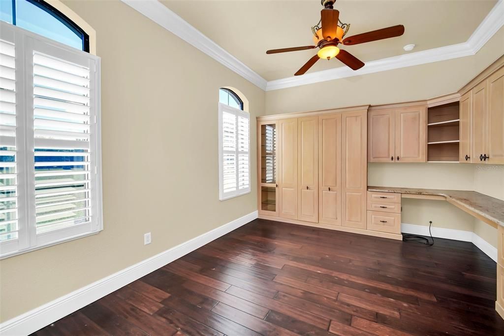 Private Office with custom built-ins, hardwood floors