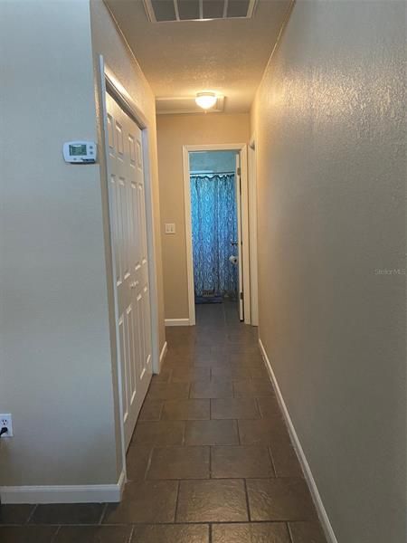 Hallway to guest bath, bedroom 3 and master bedroom