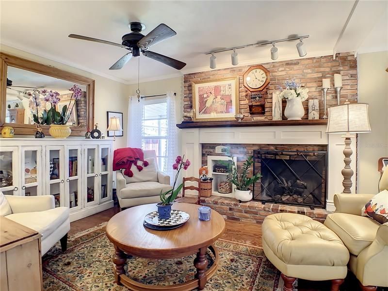Family room features a cozy gas fireplace