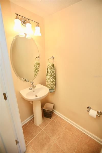 POWDER ROOM FOR GUESTS LOCATED DOWNSTAIRS.