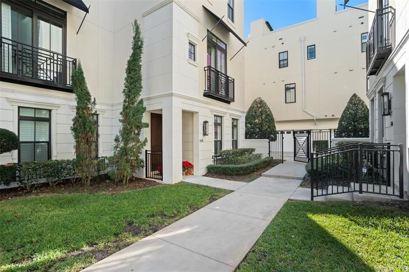 Enjoy the privacy of the gated courtyard.