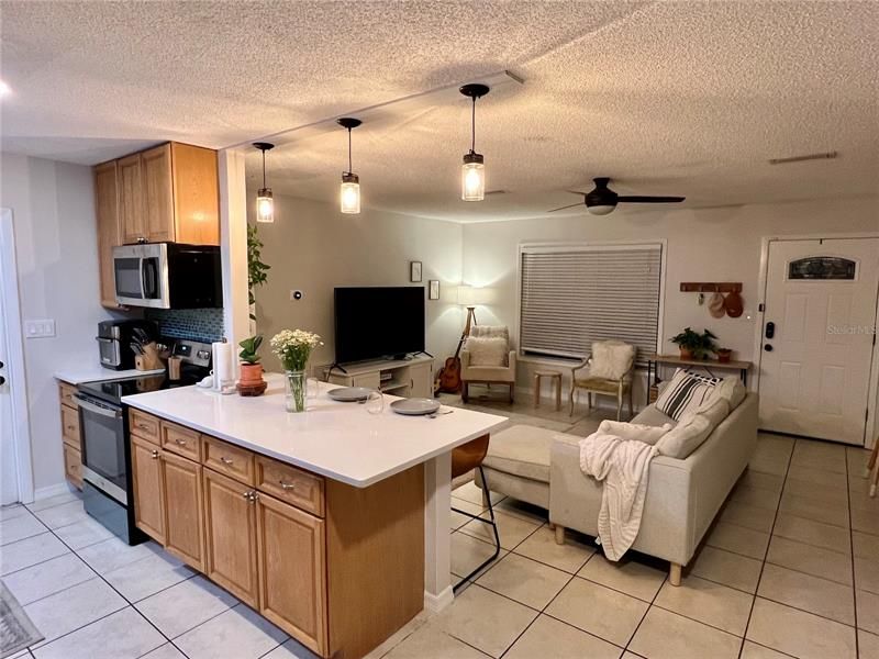 Kitchen looking into living room