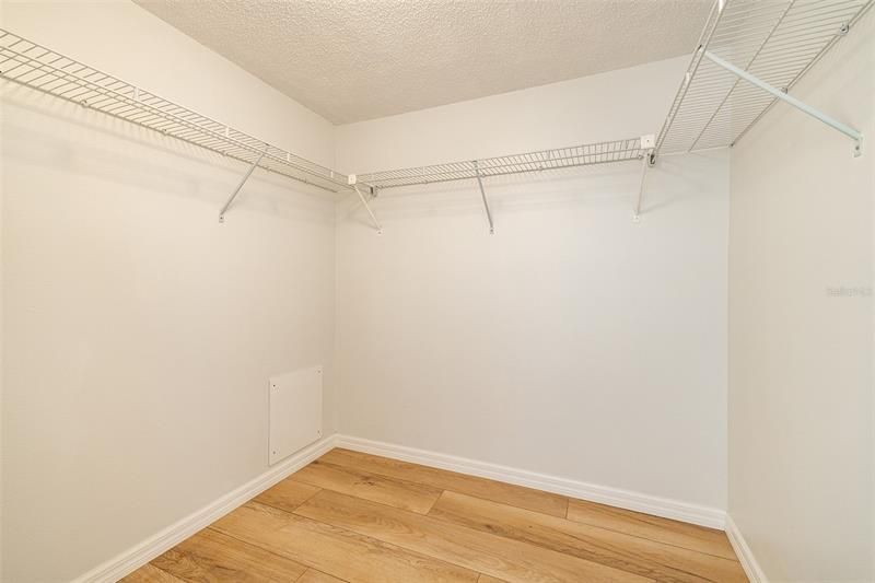 There is plenty of room in this walk-in master closet