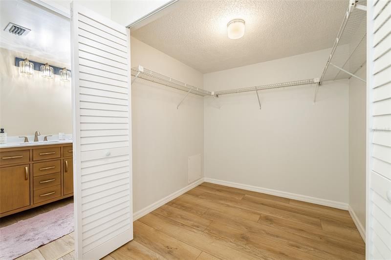The walk-in closet is just outside the master bathroom with plenty of hanging space