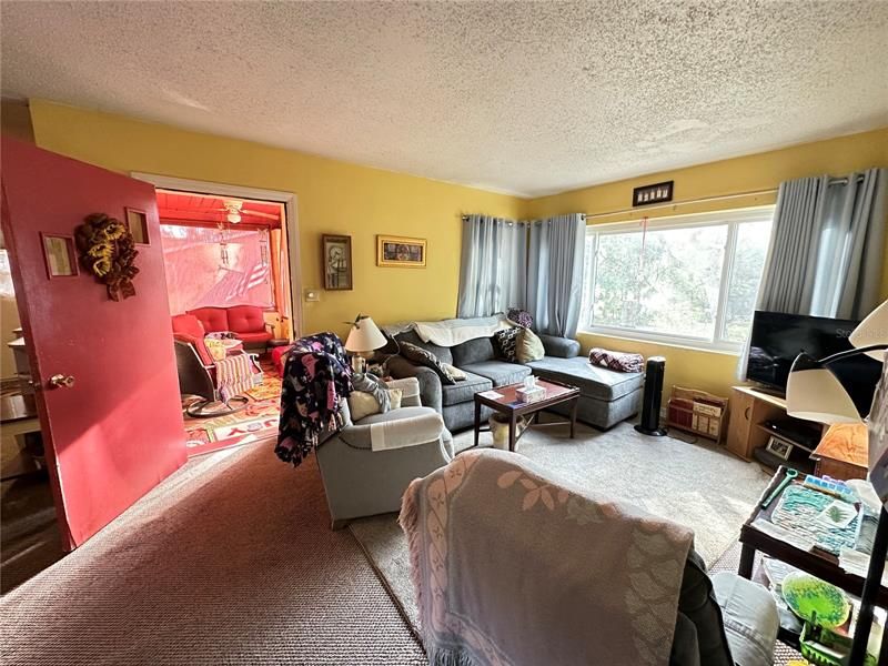 Living Room/Door to Screened In Porch