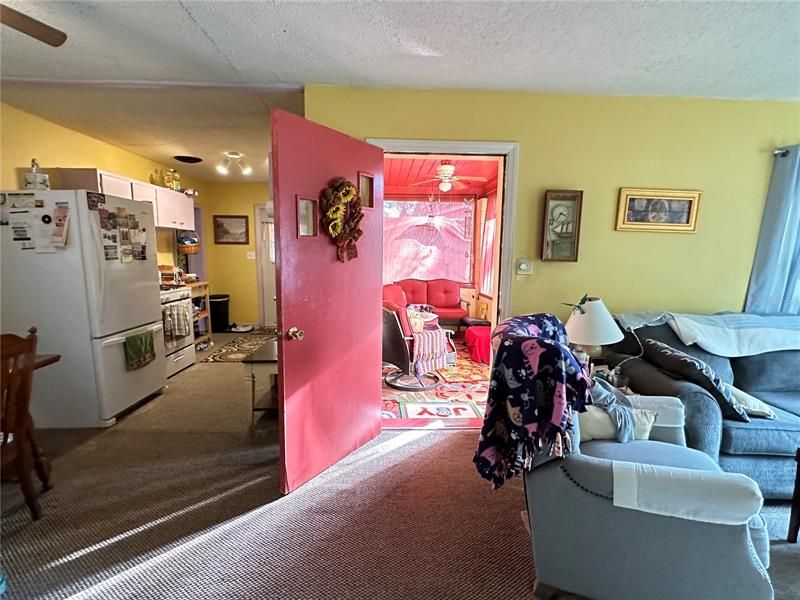 Living Room/Door to Screened In Porch