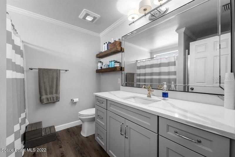 This updated bath comes complete with separate shower and tub.