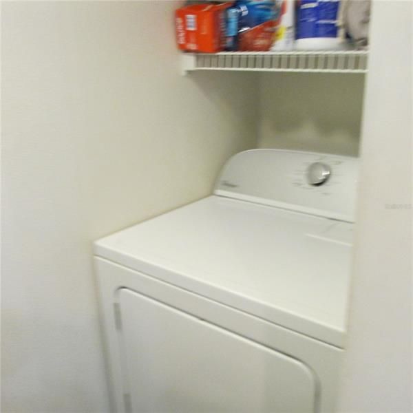 dryer in laundry room in the downstair bathroom