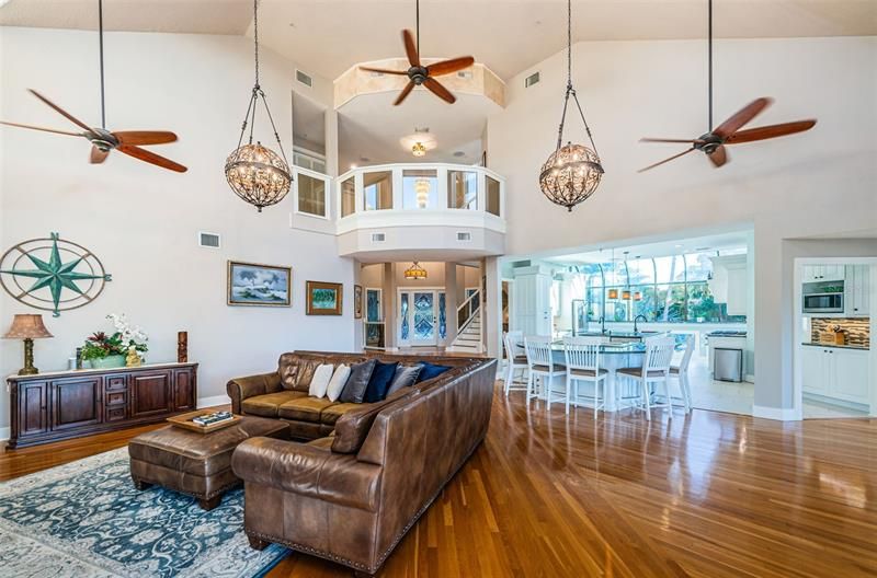 The upstairs loft overlooks the living room, while tropical ceiling fans add to the island feeling.