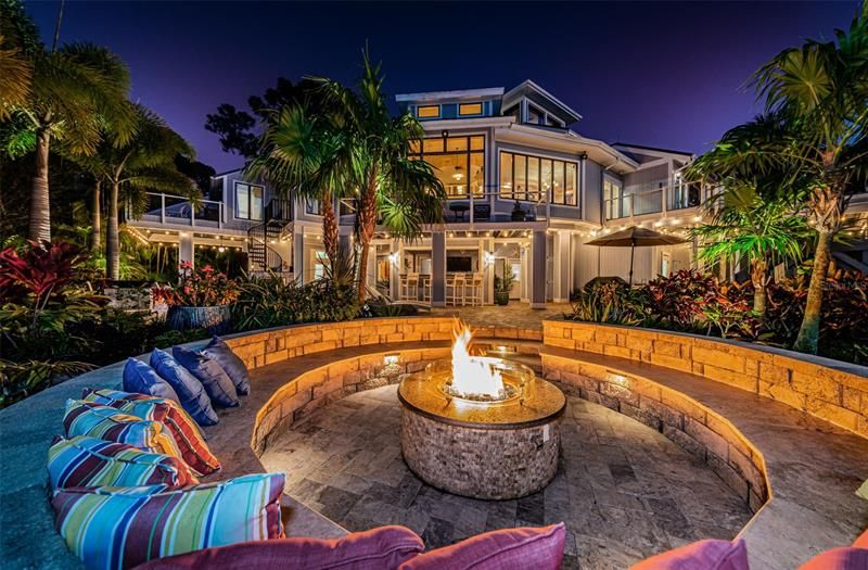 After a day on the water, enjoy the evening by the gas fire pit. THIS is pure Florida perfection!