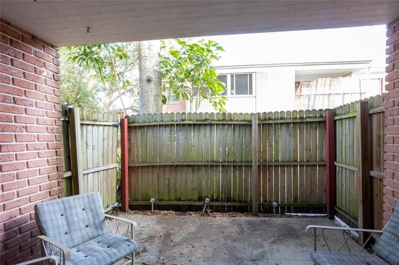 Fenced Patio with covered lanai