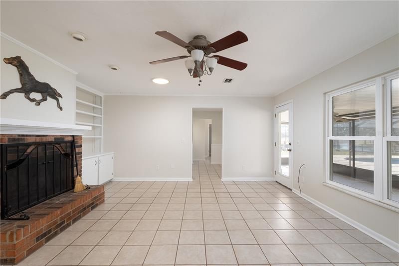 Family Room with Fireplace & built in shelving