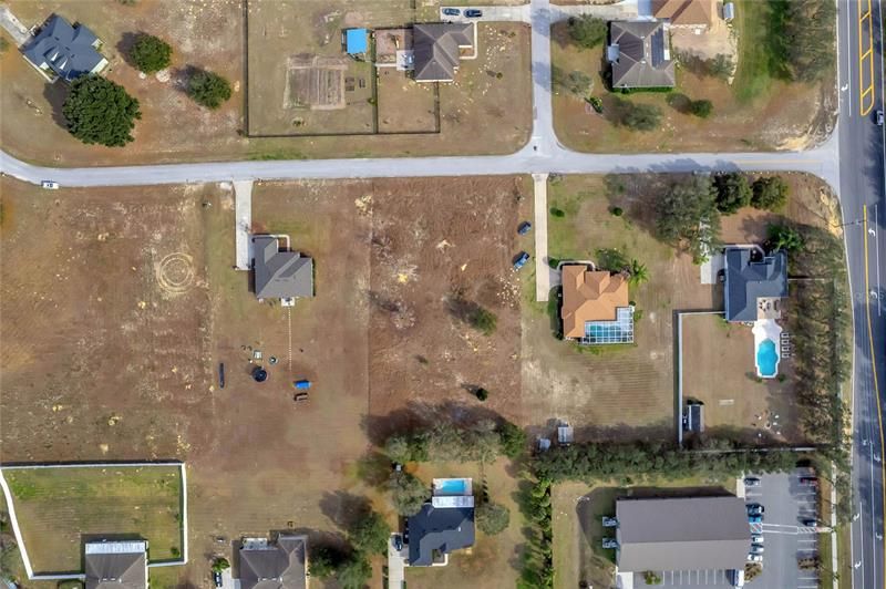 With 1 acre, there is plenty of room to build a pool and be set back from the street.
