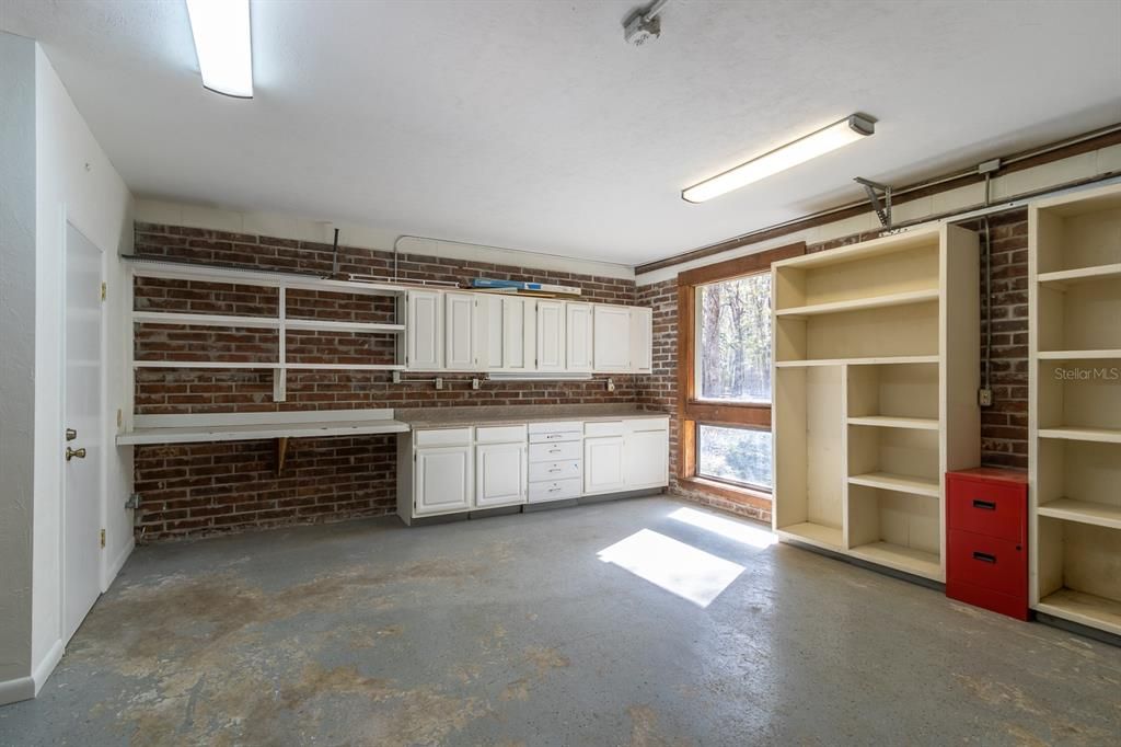 garage with lots of shelves for storage