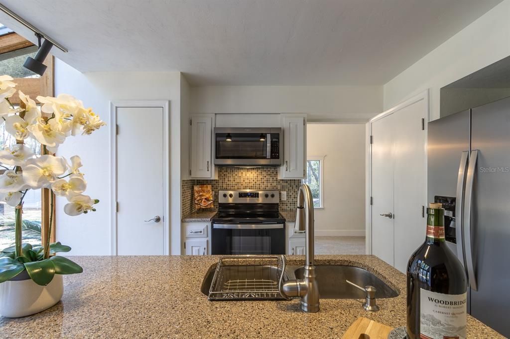 quartz counters and stainless appliances