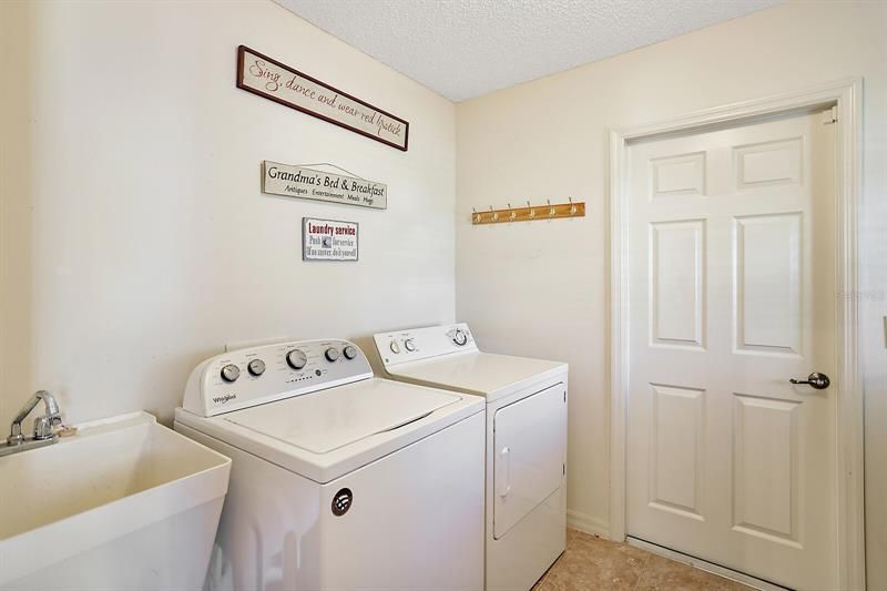 Inside laundry room w/utility sink
