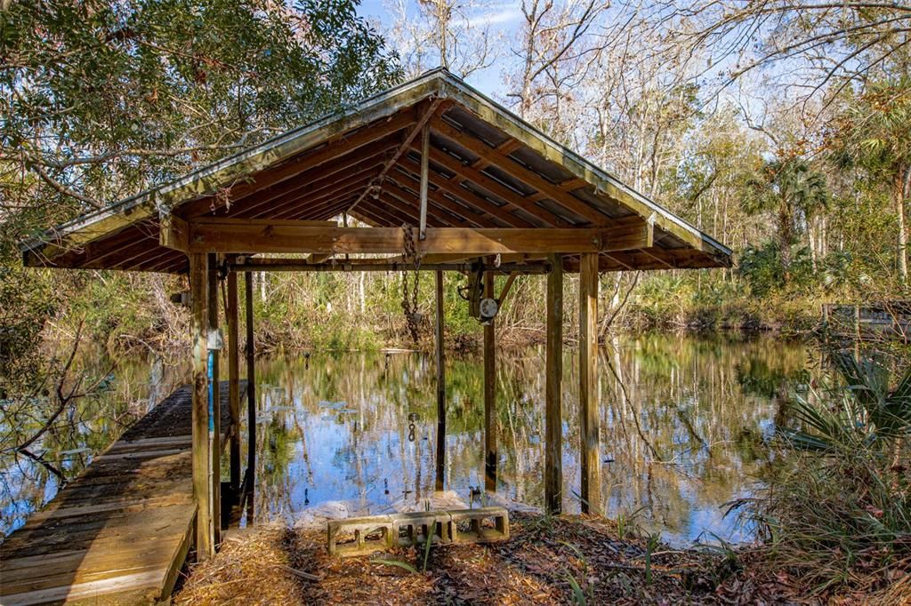 covered boat dock with electric lift