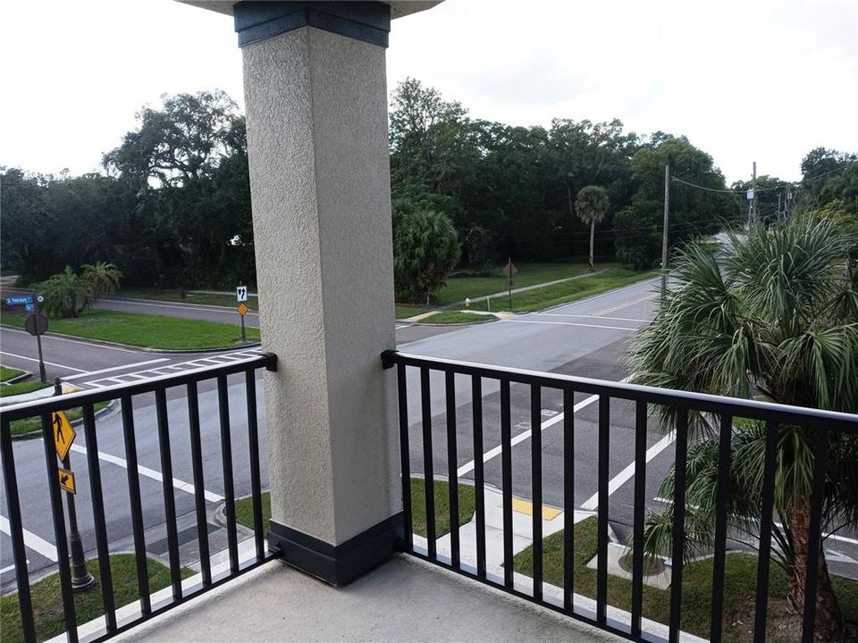 Street view from corner balcony of built unit