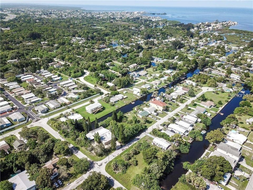 AREAL VIEW OF SUNSET ESTATES. LOT IS ON A SALT WATER CANAL.