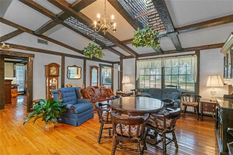 Family room that opens up into the kitchen area. Feels like being in a chalet or resort.