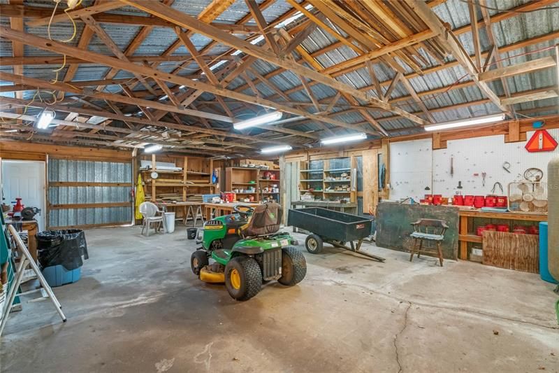 HUGE Barn -- perfect for a your own workshop, car collectors, art studio, let your imagination run wild! Plus, 100 amp service for whatever you need!