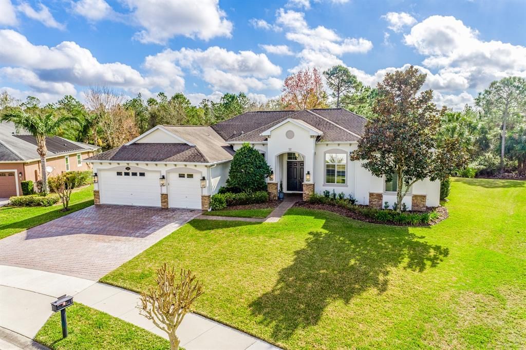 Gorgeous single story POOL HOME in the sought-after Oviedo Forest community with a bright open floor plan, built-in features, travertine tile floors and TOP-RATED SCHOOLS that include HAGERTY HIGH!