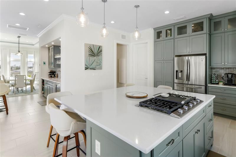 Cabinets are a soft shade of green.