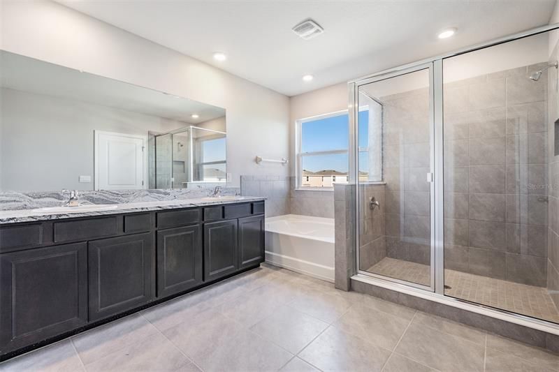 Primary Bath with Garden Tub, Dual Vanities and Shower