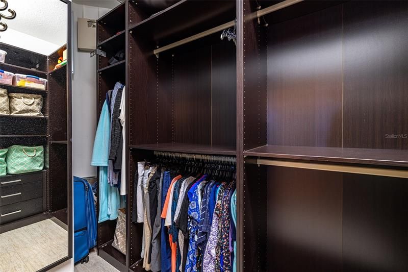 Primary bedroom closet system.