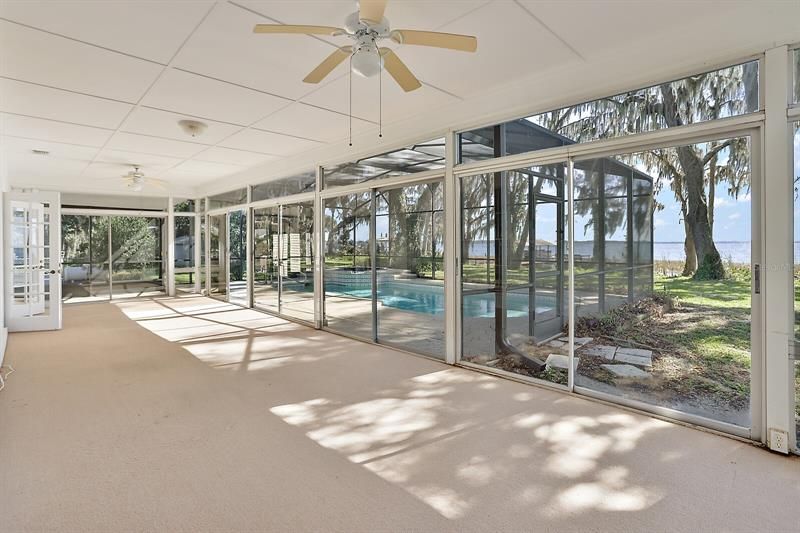 Florida room is enclosed; overlooks the pool and Lake