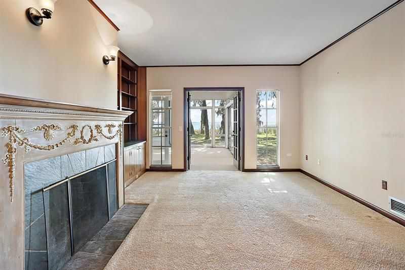 Wood burning fireplace in the office/den - with views of Lake Eustis!