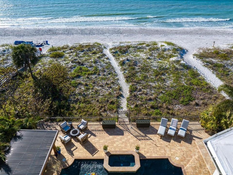 Sand dunes create a buffer between the house and the beach, offering residents both privacy and a beautiful beach view!
