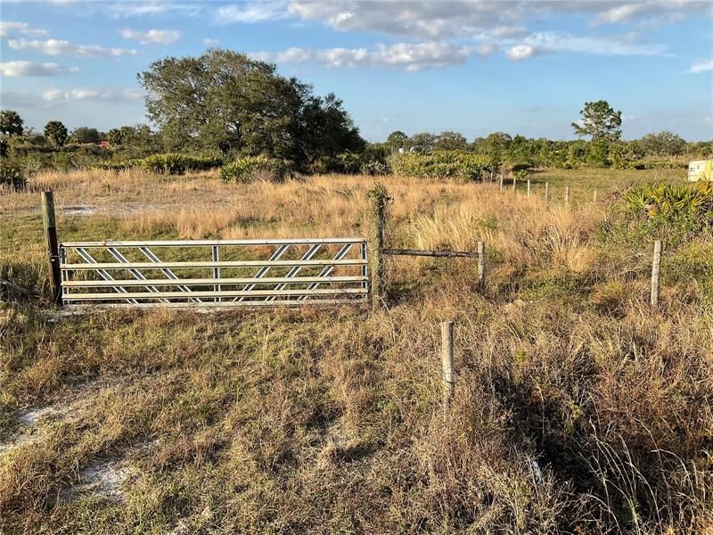 Front gate with culvert at entrance to property
