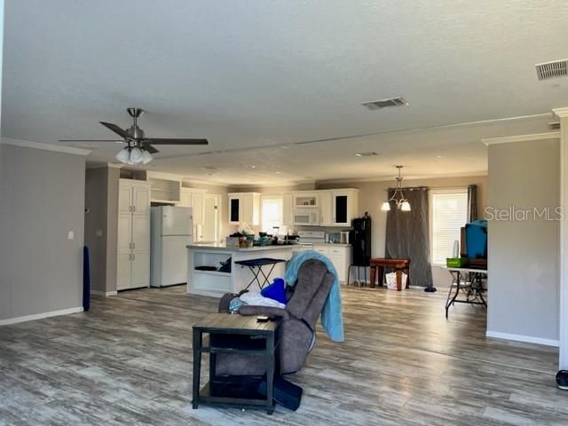 Front Door looking into Kitchen, Living Room and Dining Room