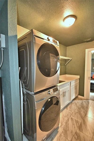 Washer and dryer convey with the home.