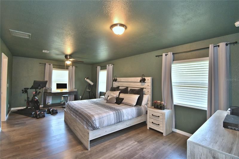 Master bedroom is large enough for a sitting area or exercise equipment without being crowded