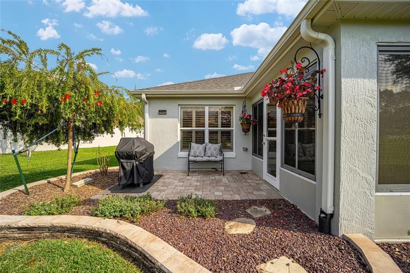 The paver brick patio is perfect for the grill