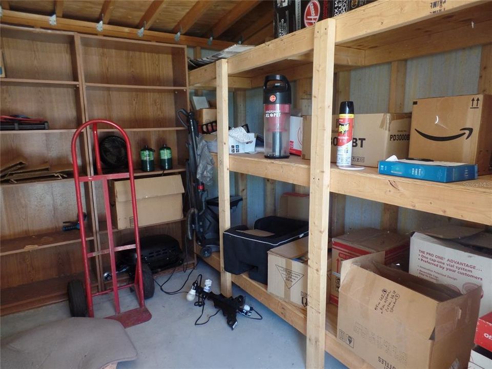 Separate storage room attached to garage