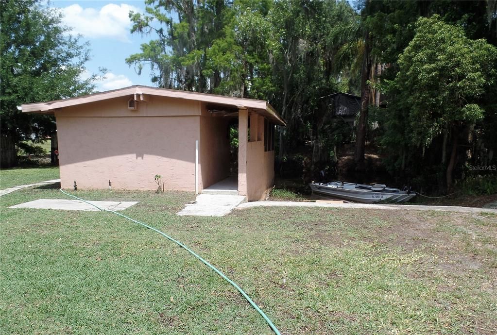 Block Boathouse. Sea-wall, storage, boat lift and ramp