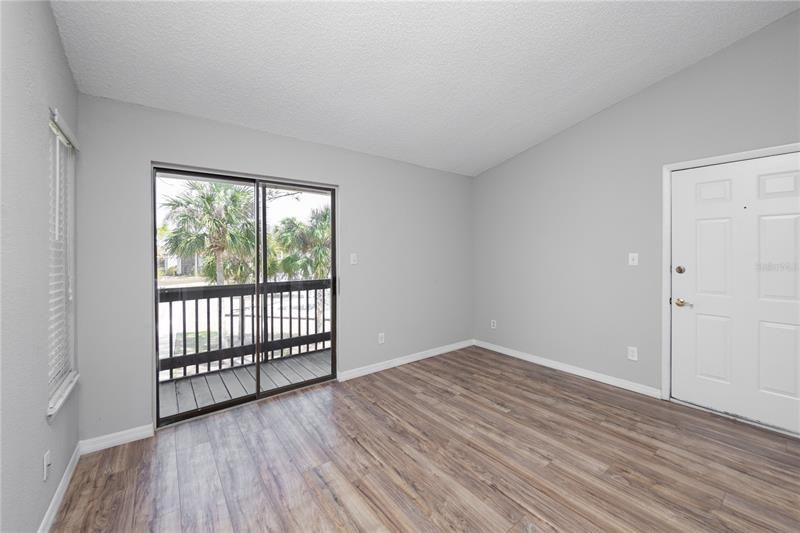 Vaulted ceiling and modern flooring