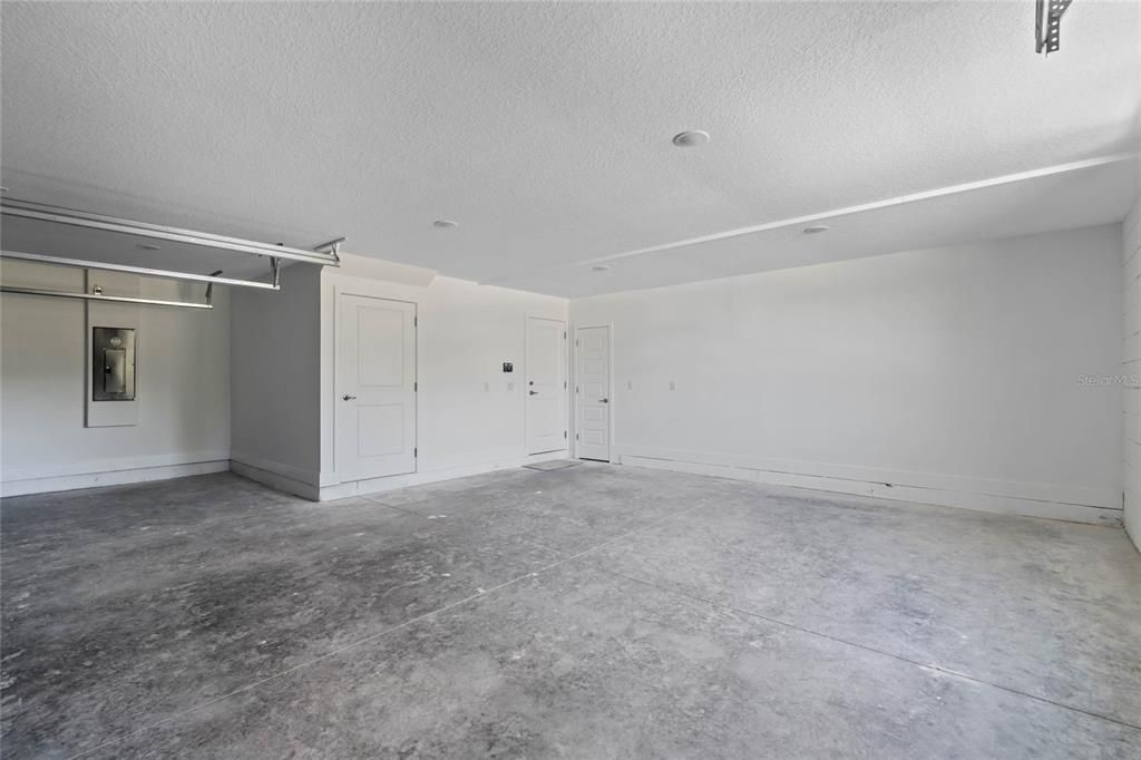 Garage features two closets, one climate controlled.