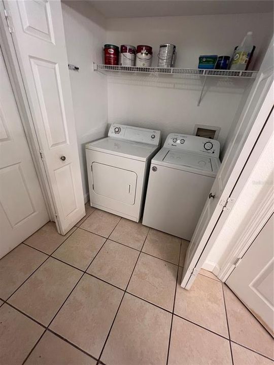 Washer and Dryer in closet.