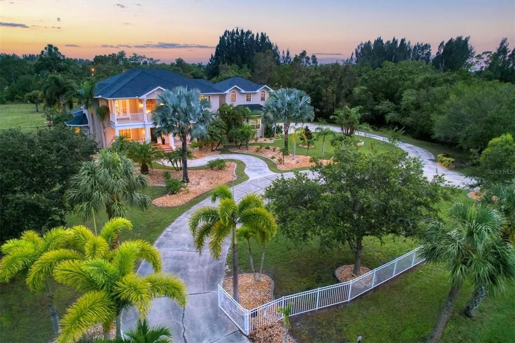 Lush Landscaping around two-story home.