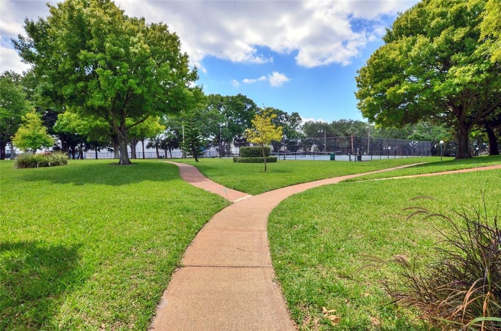 Ample jogging paths with plenty of pet stations throughout the property.  This community boasts a playground, basketball courts, tennis courts, and a large, sparkling pool!