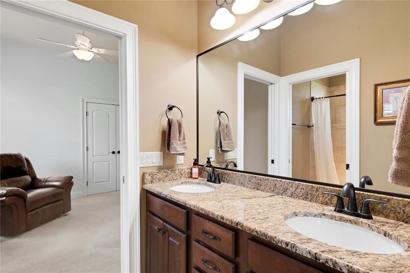 BATH 2 showing DUAL SINKS  and a pocket door for tub/shower-commode privacy