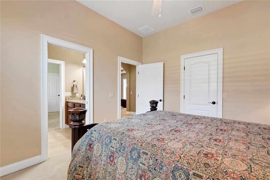 BEDROOM 2 with view of Jack Jill bath that has private commode, tub/shower